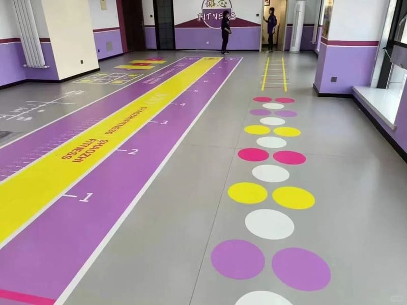 Close-up of PVC flooring texture and foam backing layer